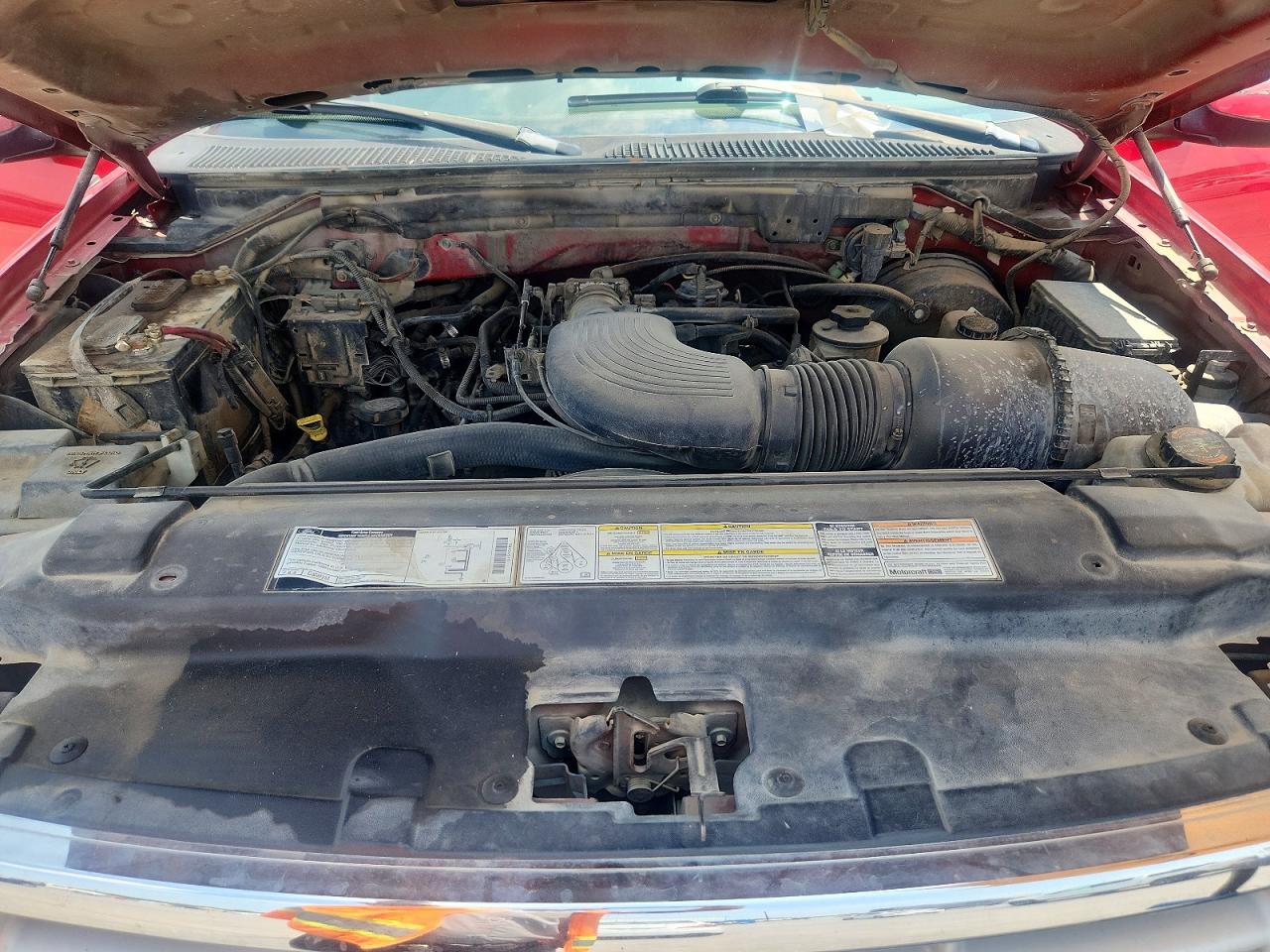 1999 Ford F150 Red vin: 1FTRX07L6XKC25105