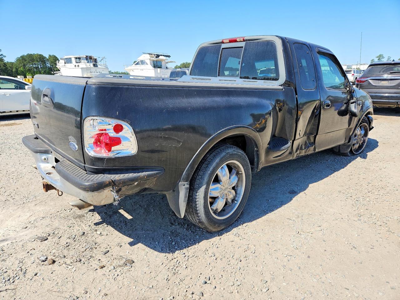 1999 Ford F150 Black vin: 1FTRX07LXXKA13100