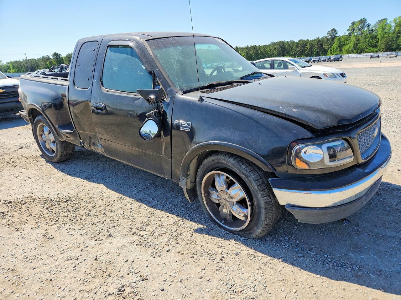 1999 Ford F150 Black vin: 1FTRX07LXXKA13100
