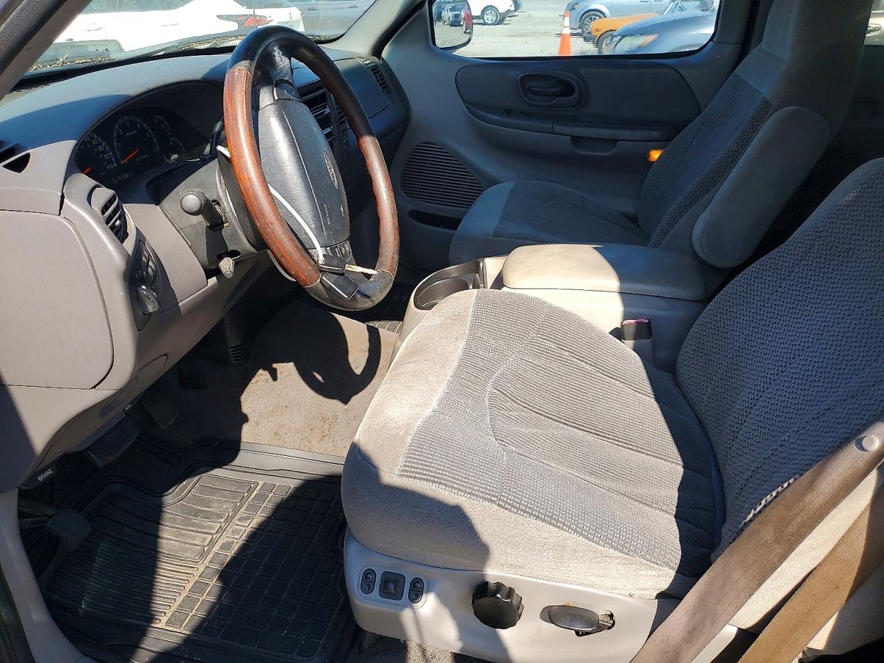 1999 Ford F150 Серебряный vin: 1FTRX07W0XKA46035