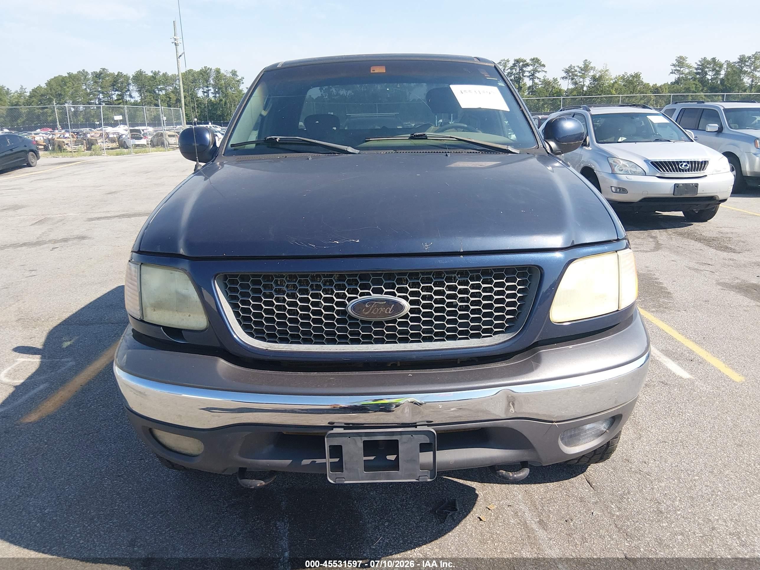 2003 Ford F150   Blue vin: 1FTRX08L23KD85488