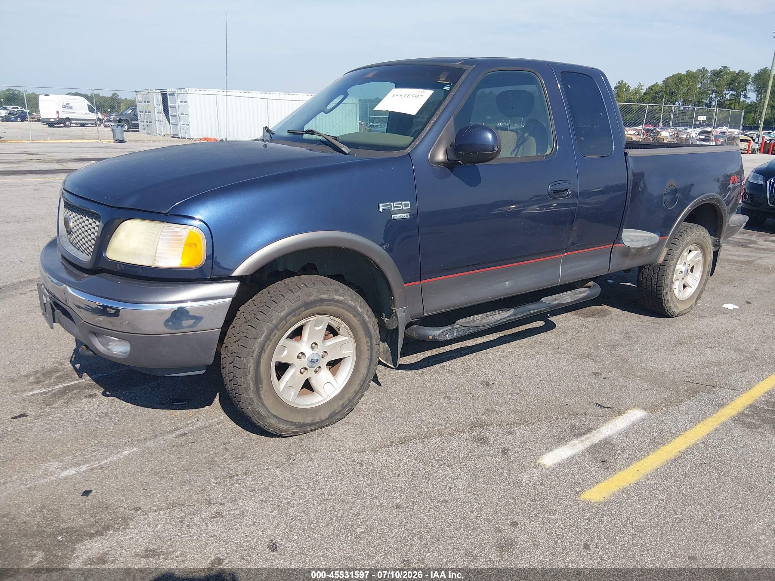 2003 Ford F150   Blue vin: 1FTRX08L23KD85488