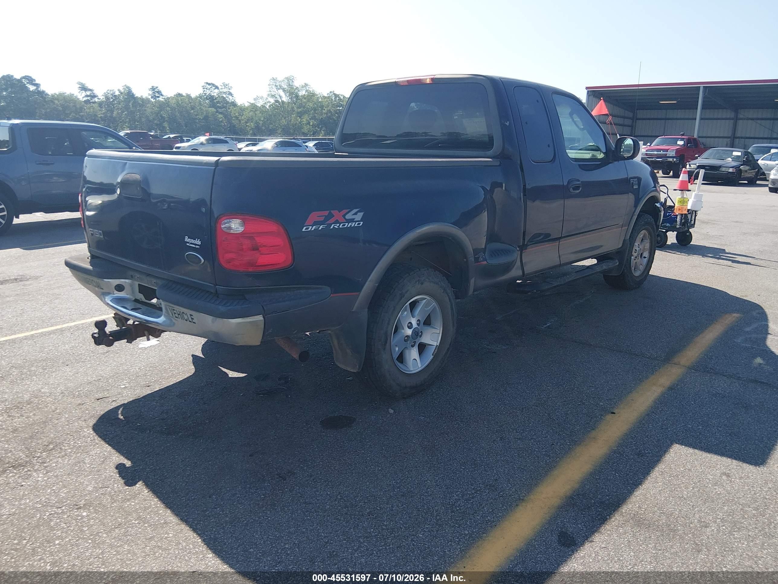 2003 Ford F150   Blue vin: 1FTRX08L23KD85488