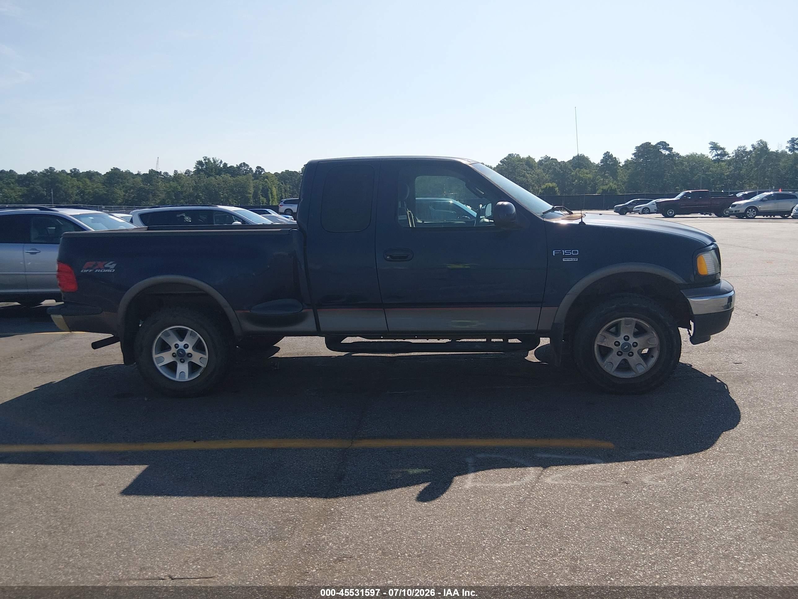 2003 Ford F150   Blue vin: 1FTRX08L23KD85488