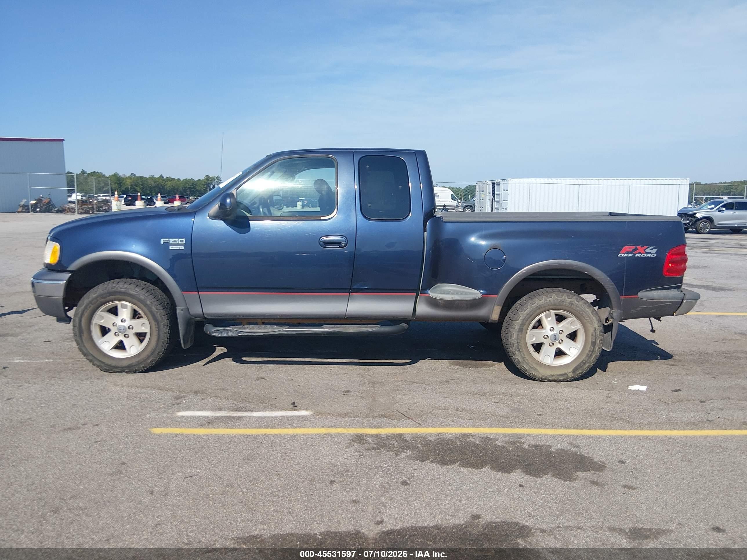 2003 Ford F150   Blue vin: 1FTRX08L23KD85488