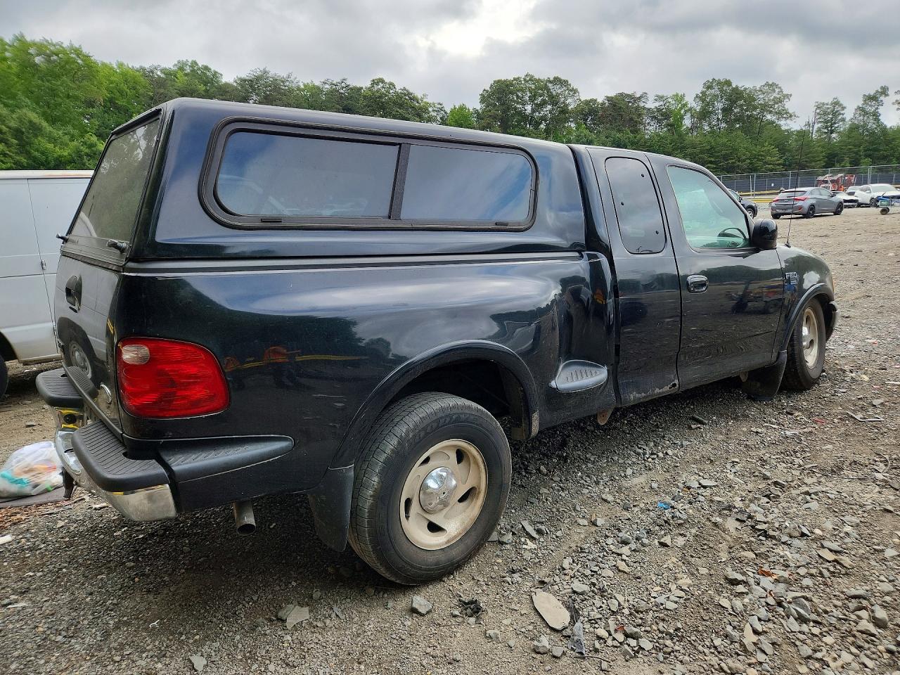 2001 Ford F150 Black vin: 1FTRX08LX1KF01601