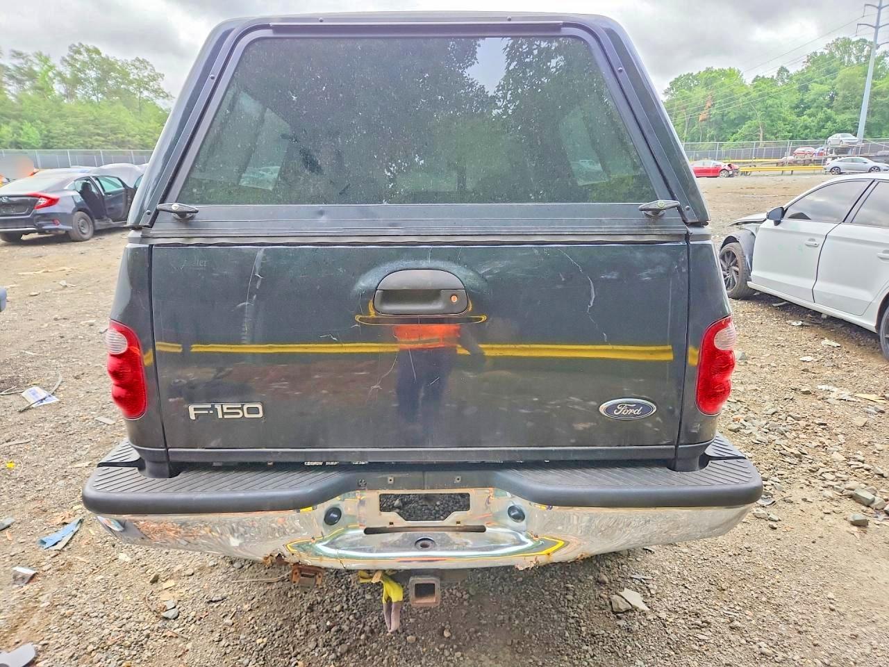 2001 Ford F150 Black vin: 1FTRX08LX1KF01601