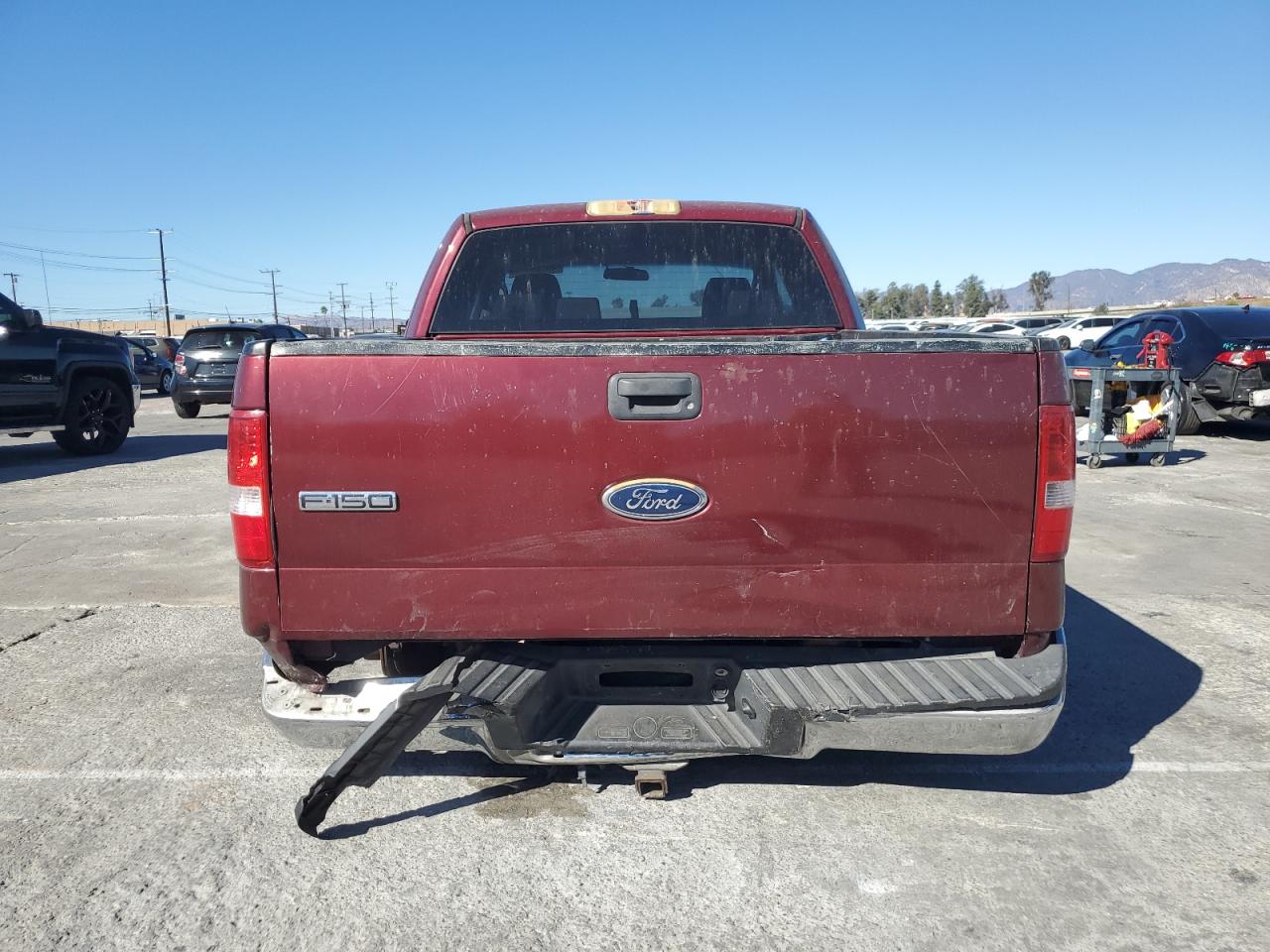 2004 Ford F150 Maroon vin: 1FTRX12574KD09895