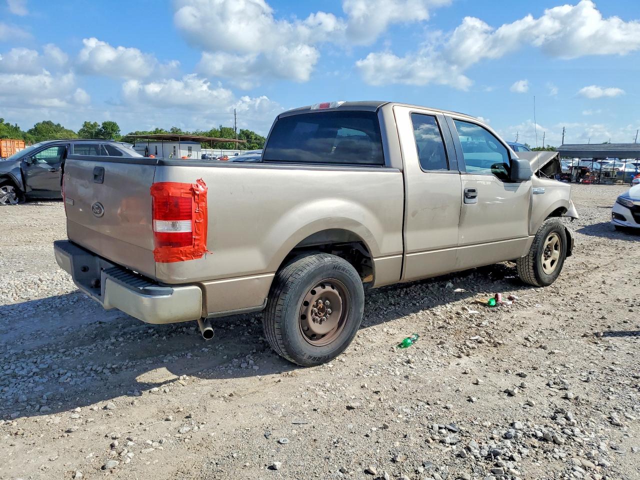 2005 Ford F150 Tan vin: 1FTRX12W05KD71049