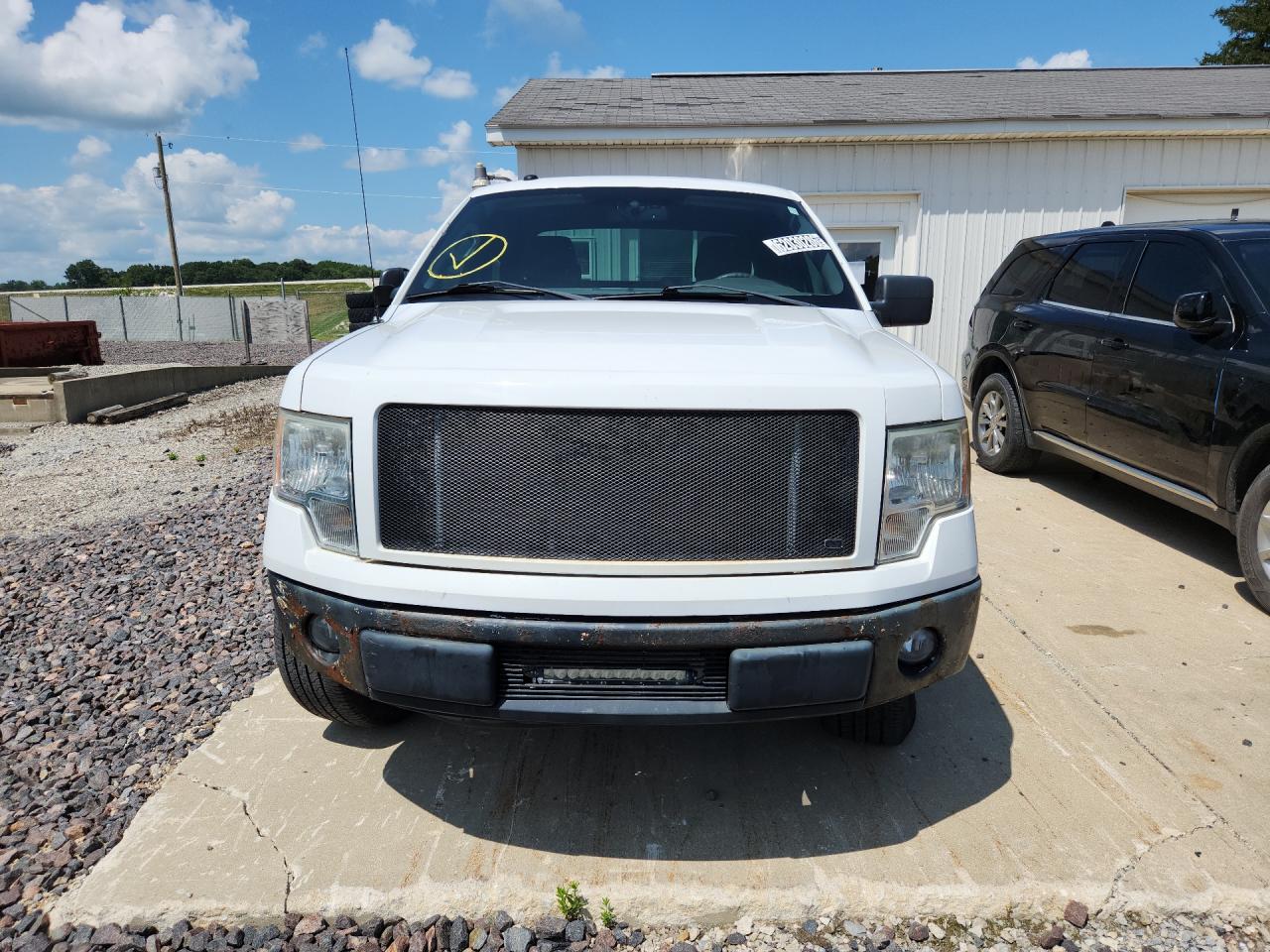 2009 Ford F150 Super Cab White vin: 1FTRX12W19FA99710 Damage: Front Bumper Cover Upper, Scraped, 1/2 To 1 Inch