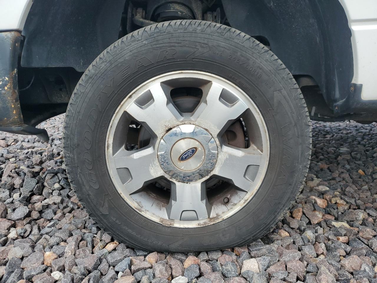 2009 Ford F150 Super Cab White vin: 1FTRX12W19FA99710 Damage: Left Front Wheel, Corrosion, > 12 Inches