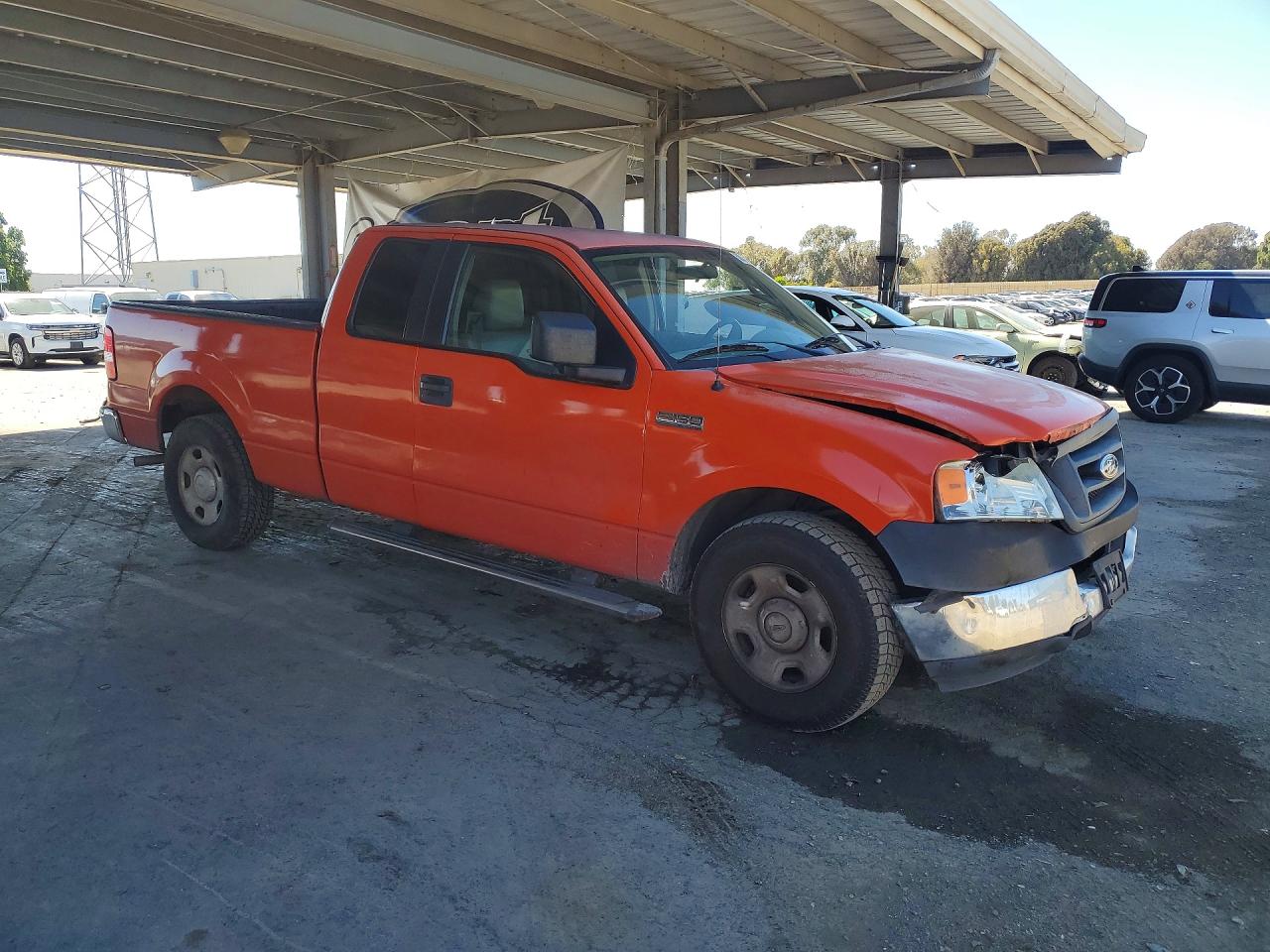 2005 Ford F150 Orange vin: 1FTRX12W25KB82841