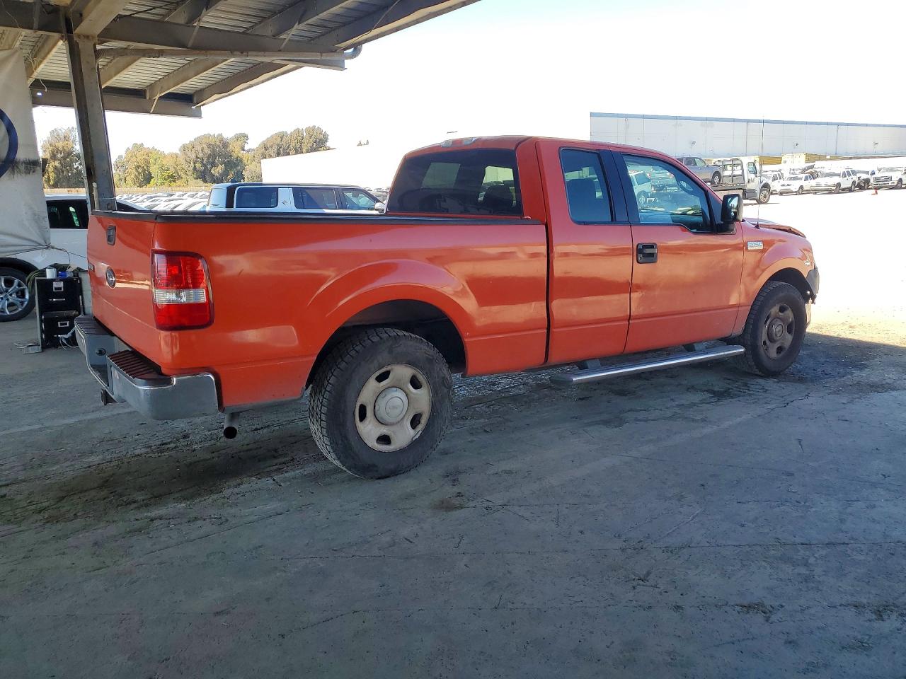 2005 Ford F150 Orange vin: 1FTRX12W25KB82841