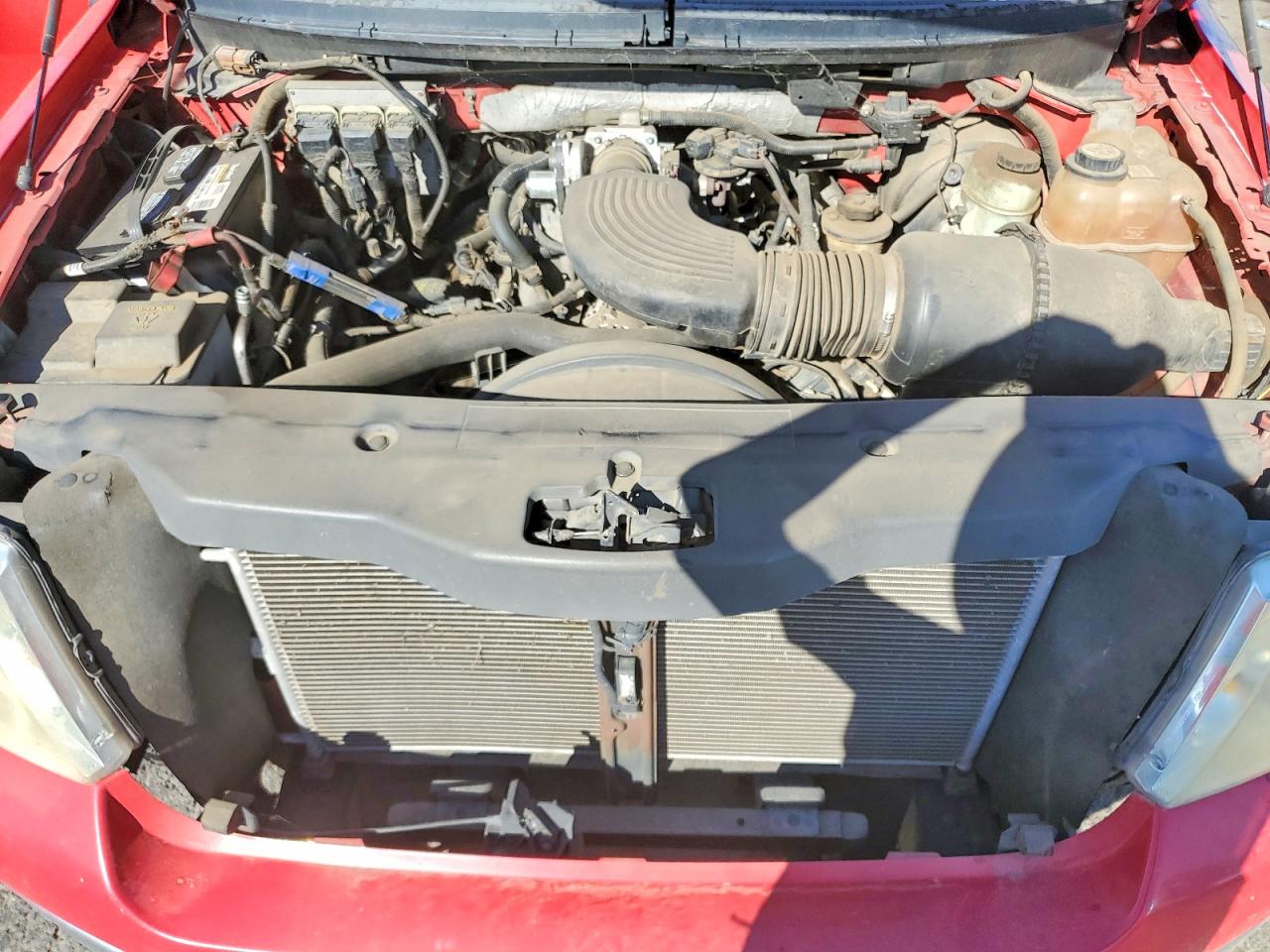 2006 Ford F150 Red vin: 1FTRX12W56NB16574