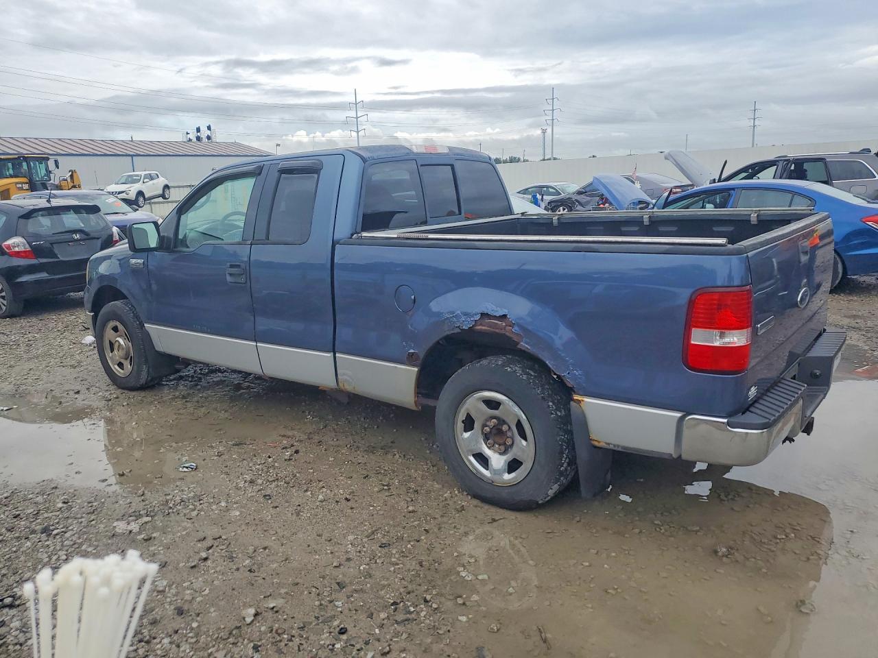 2004 Ford F150 Blue vin: 1FTRX12W74NB14645