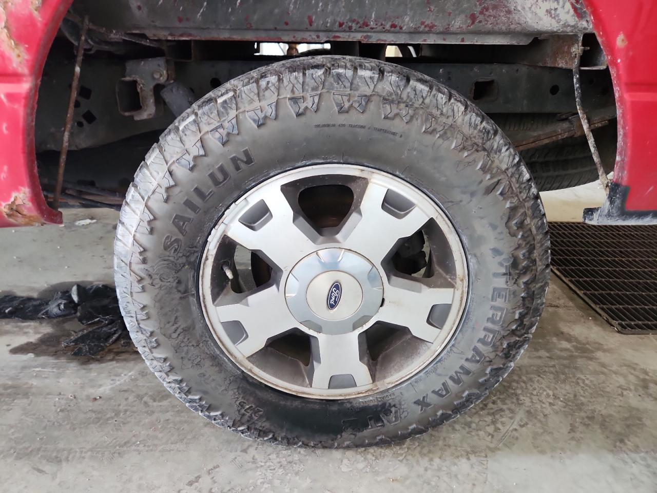 2009 Ford F150 Super Cab Red vin: 1FTRX14W59KB43678 Damage: Left Rear Wheel, Curb Rash, > 12 Inches