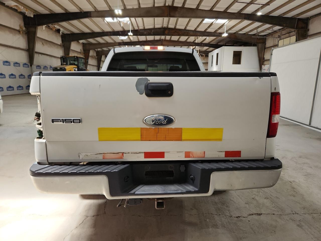 2008 Ford F150 White vin: 1FTRX14W68KC89294 Damage: Tailgate, Peeling, 5 To 6 Inches