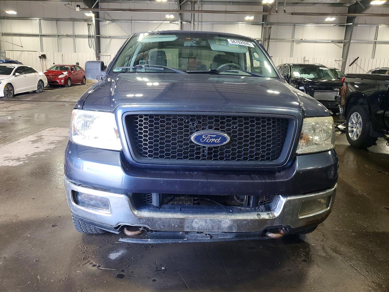 2004 Ford F150 Blue vin: 1FTRX14W74NA74998