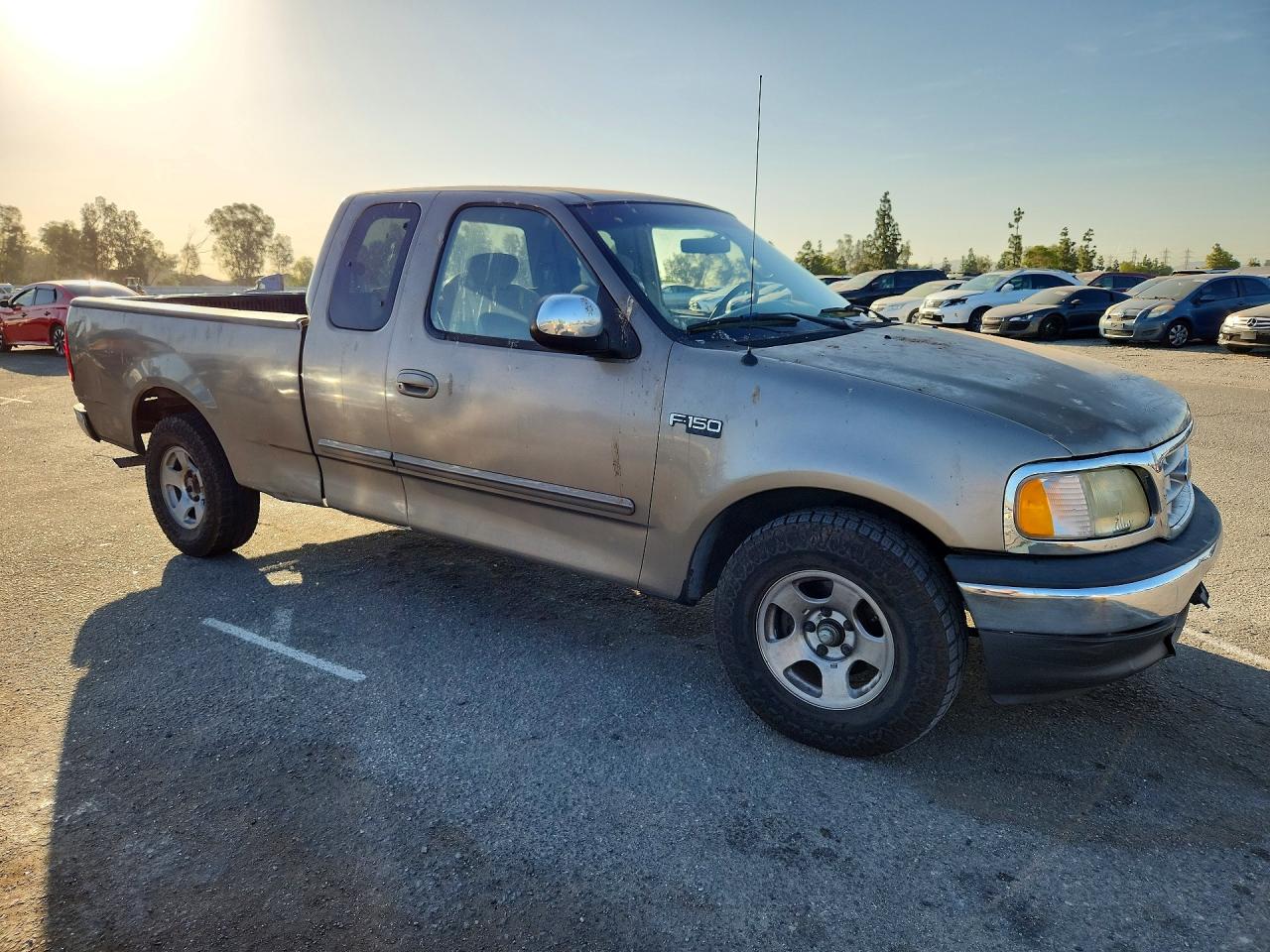 2002 Ford F150 Tan vin: 1FTRX17242NA85205