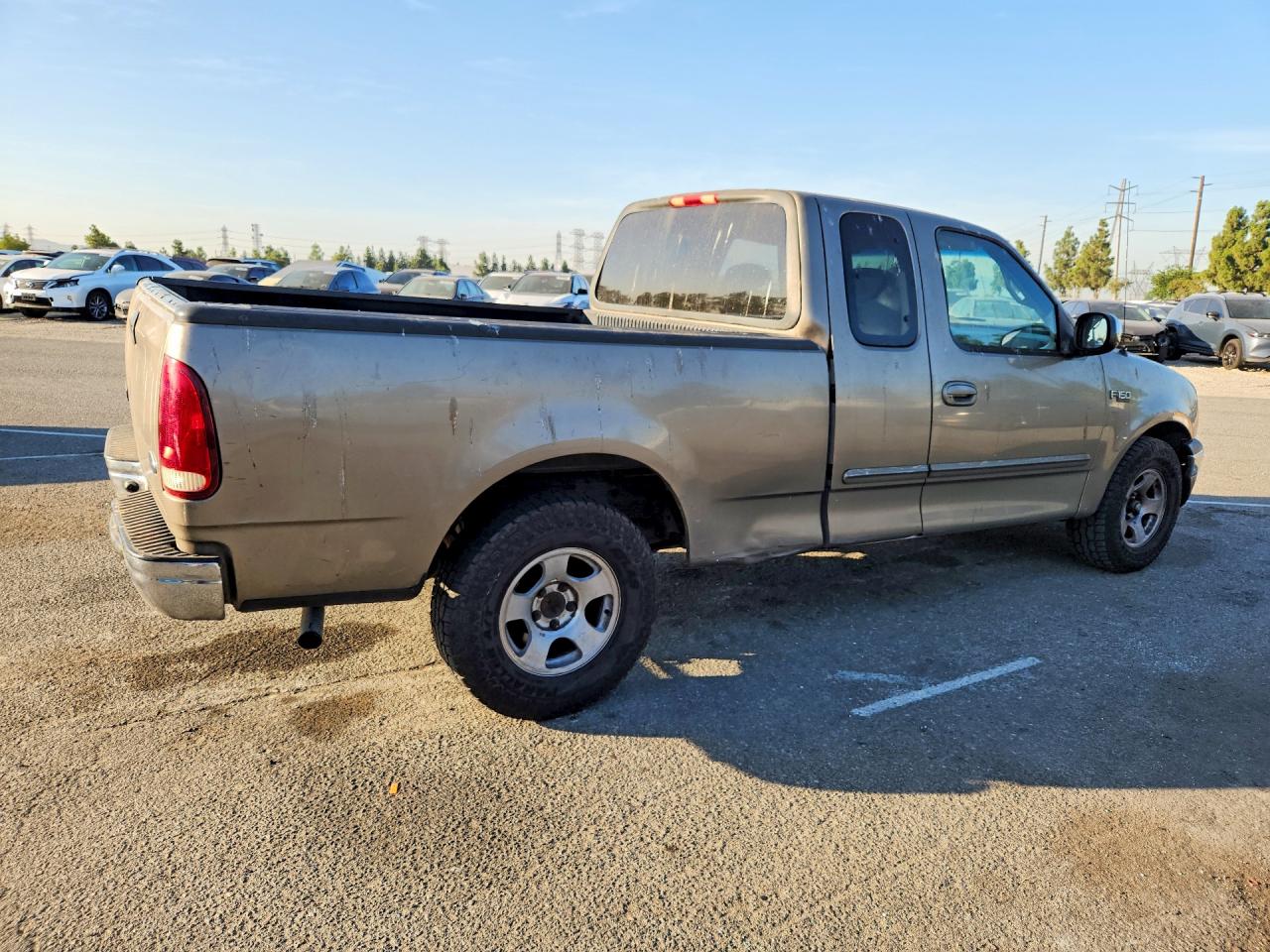 2002 Ford F150 Tan vin: 1FTRX17242NA85205