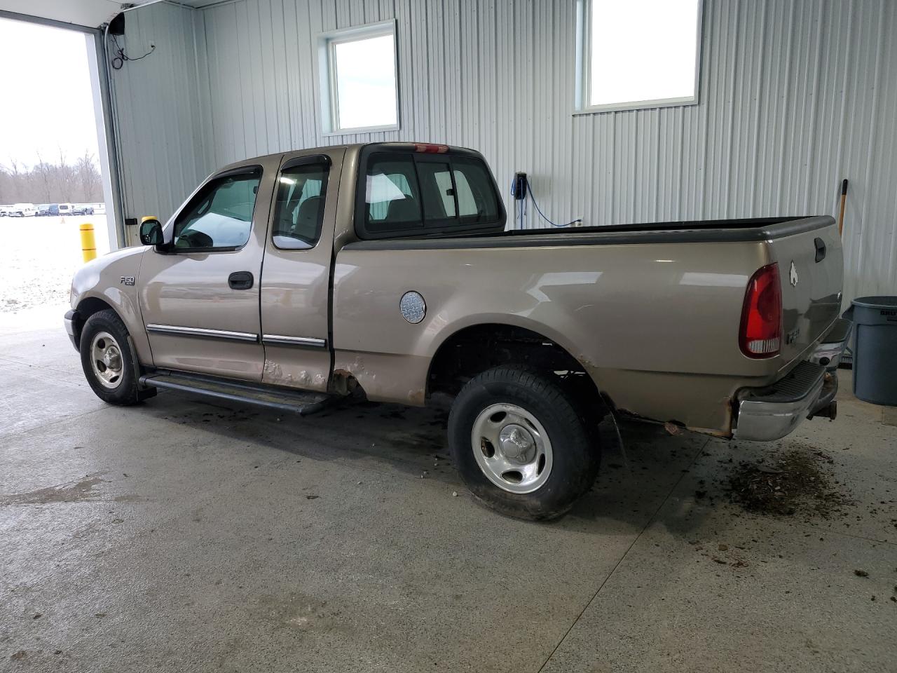 2002 Ford F150 Tan vin: 1FTRX172X2NA76069 Damage: Left Front Door, Dent(S) W/ Paint Dmg, 1 To 2 Inches