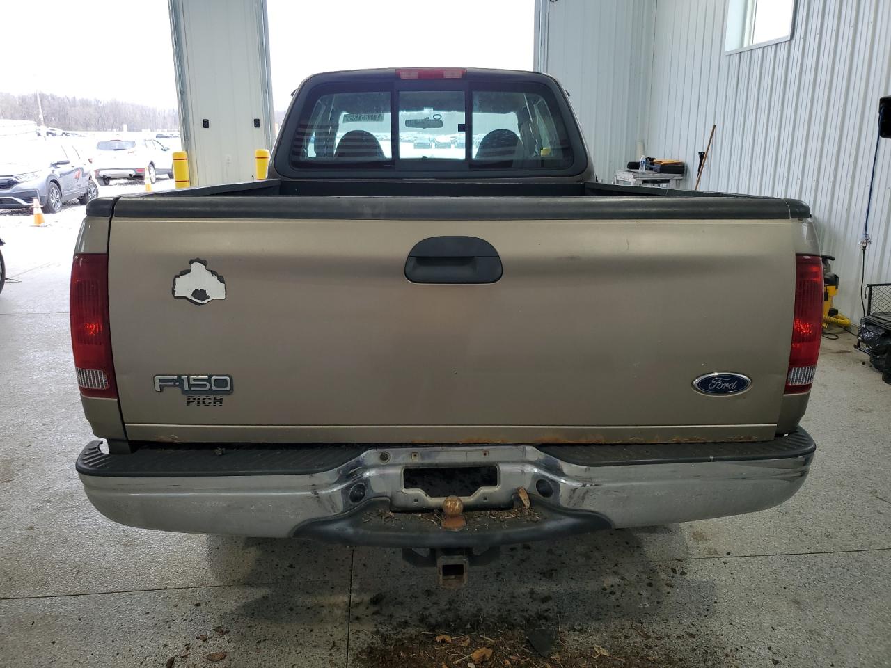 2002 Ford F150 Tan vin: 1FTRX172X2NA76069 Damage: Tailgate, Rust, > 12 Inches