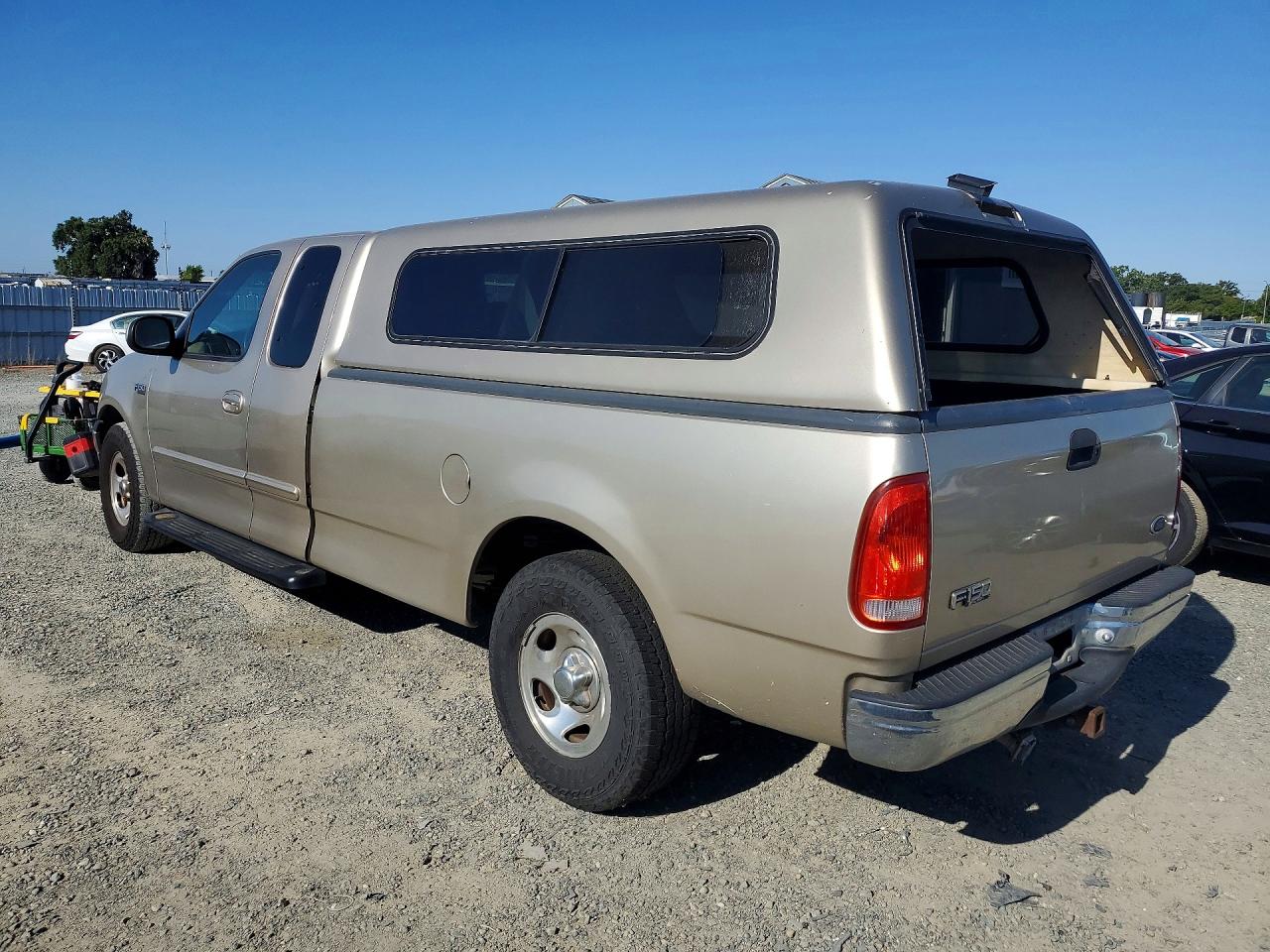1999 Ford F150 Tan vin: 1FTRX17W0XKA10979