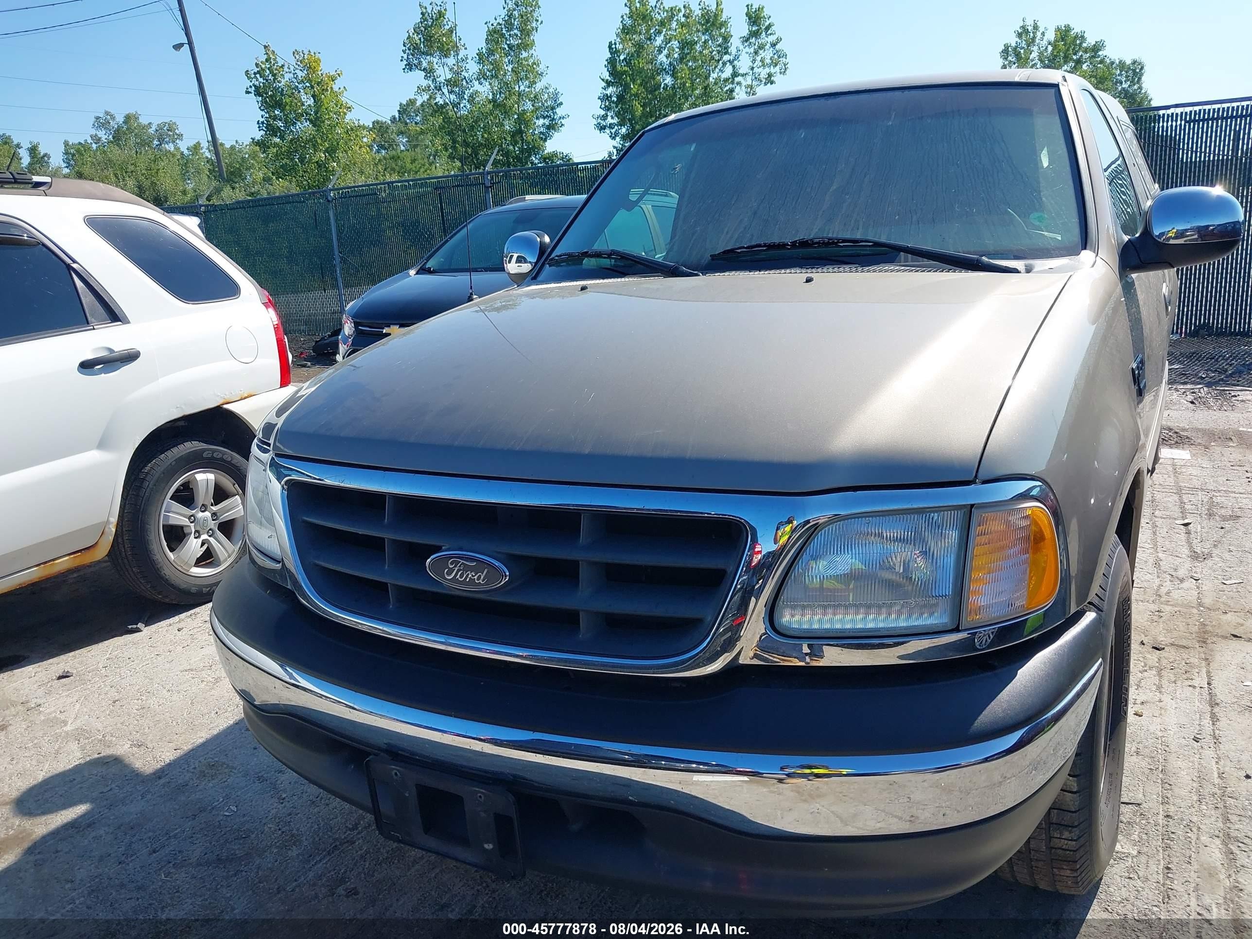 2002 Ford F150   Brown vin: 1FTRX17W52NB43079