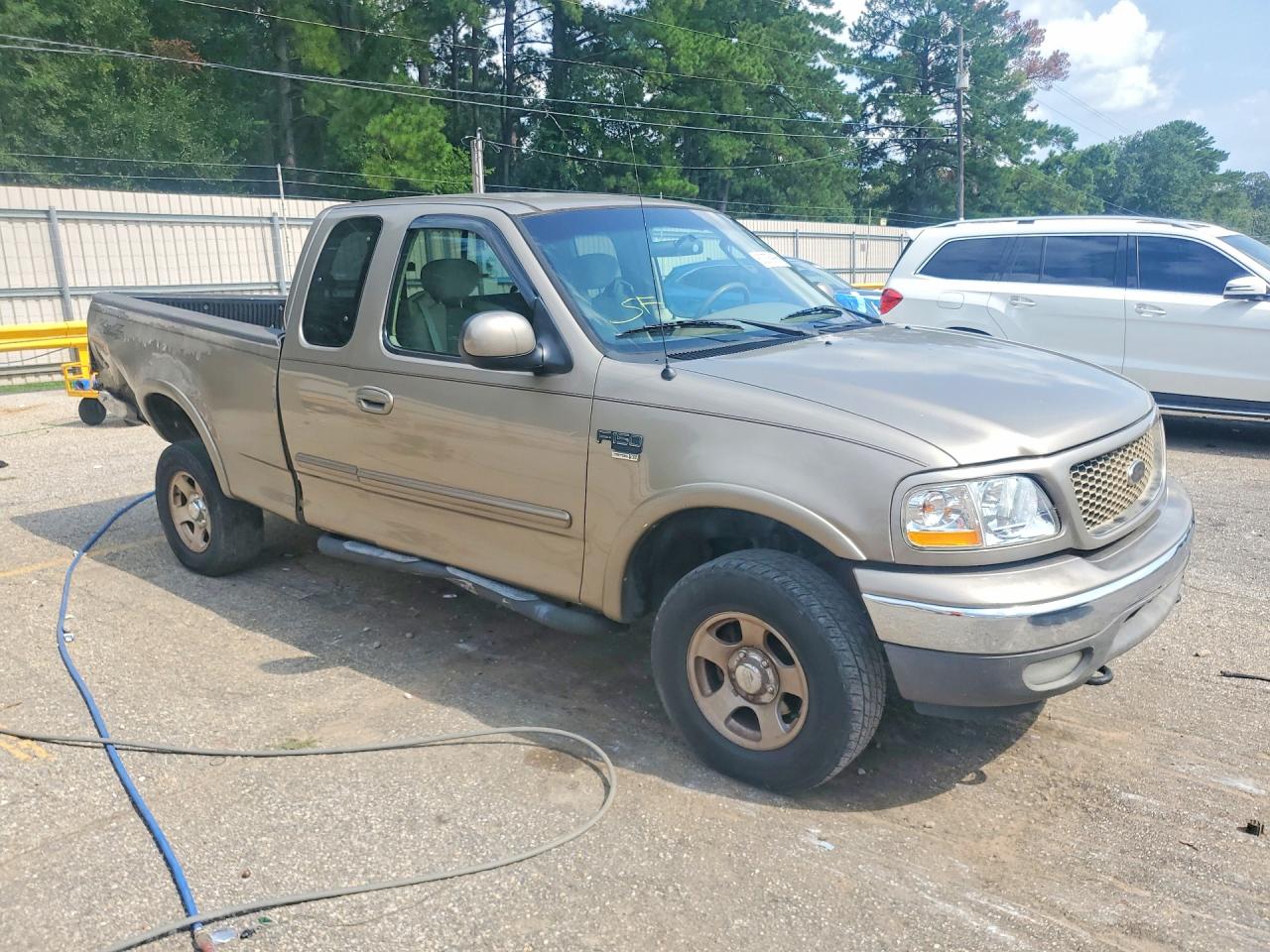 2003 Ford F150 Gold vin: 1FTRX18L03NB76660