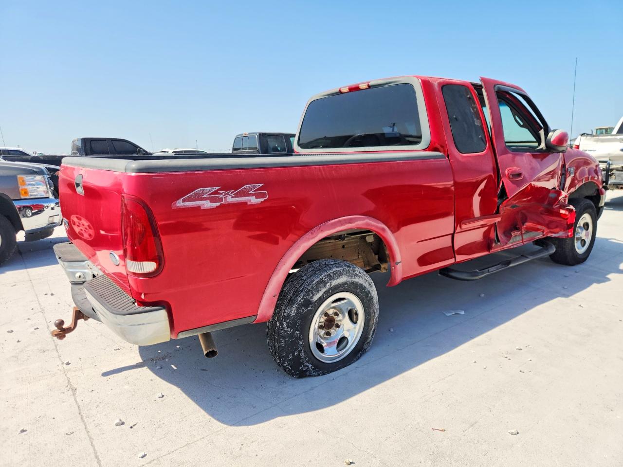 1999 Ford F150 Red vin: 1FTRX18L0XKB98343