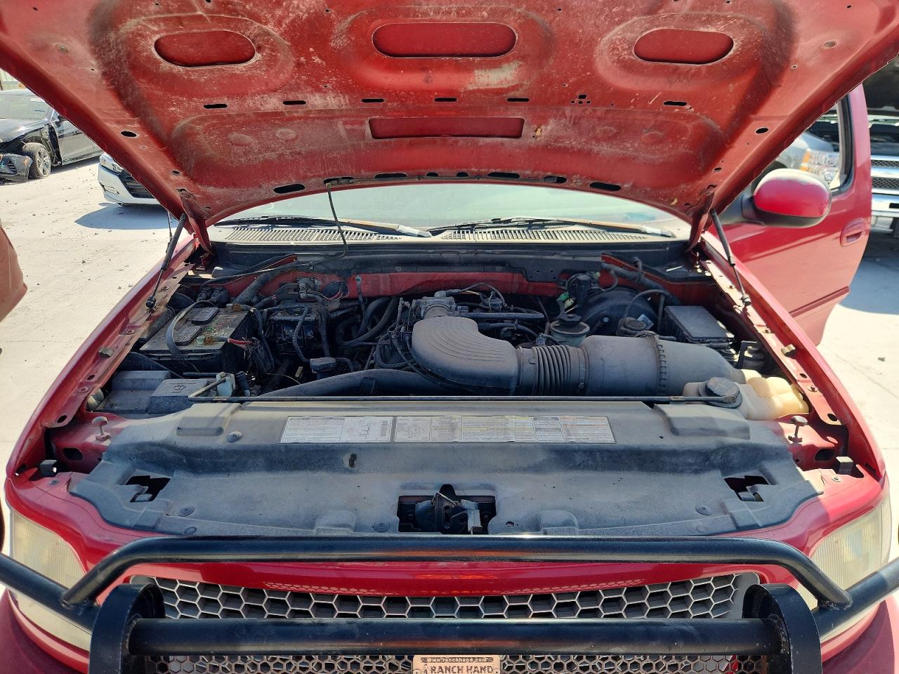 1999 Ford F150 Red vin: 1FTRX18L0XKB98343