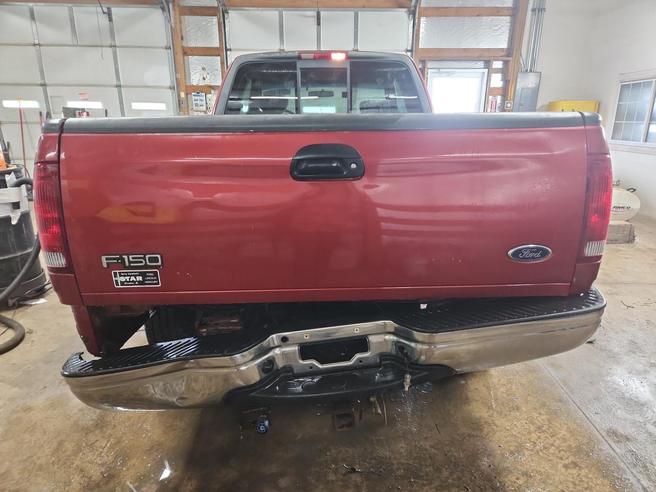 2001 Ford F150 Red vin: 1FTRX18L11NB36620 Damage: Tailgate, Dent(S) W/ Paint Dmg, 1 To 2 Inches