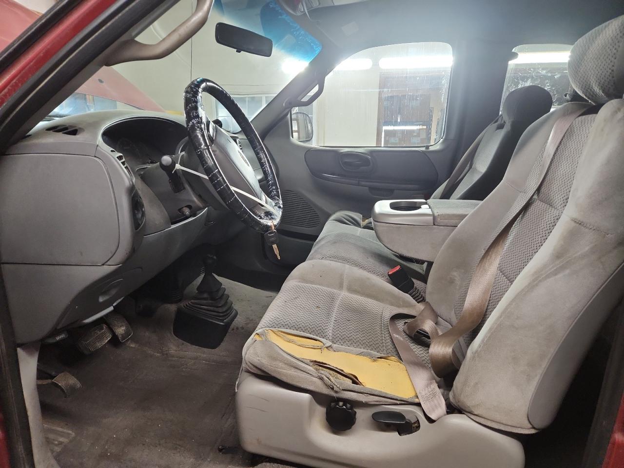 2001 Ford F150 Red vin: 1FTRX18L11NB36620 Damage: Left Front Seat, Torn, > 12 Inches
