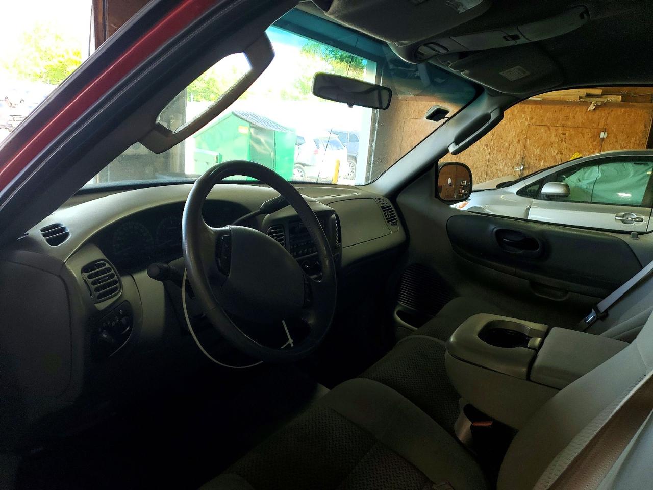2002 Ford F150 Red vin: 1FTRX18L12NB55234