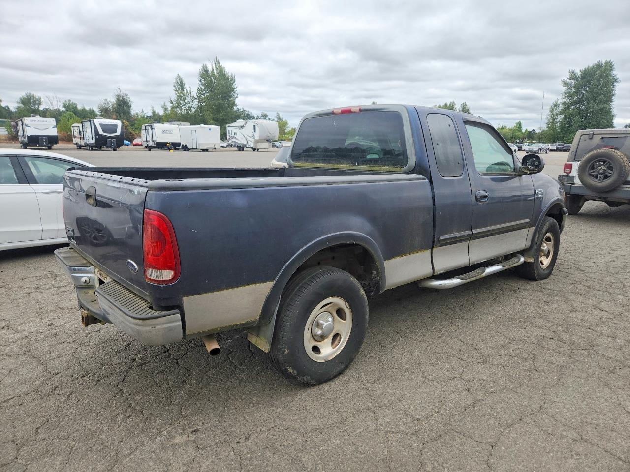 2000 Ford F150 Blue vin: 1FTRX18L2YNA44491