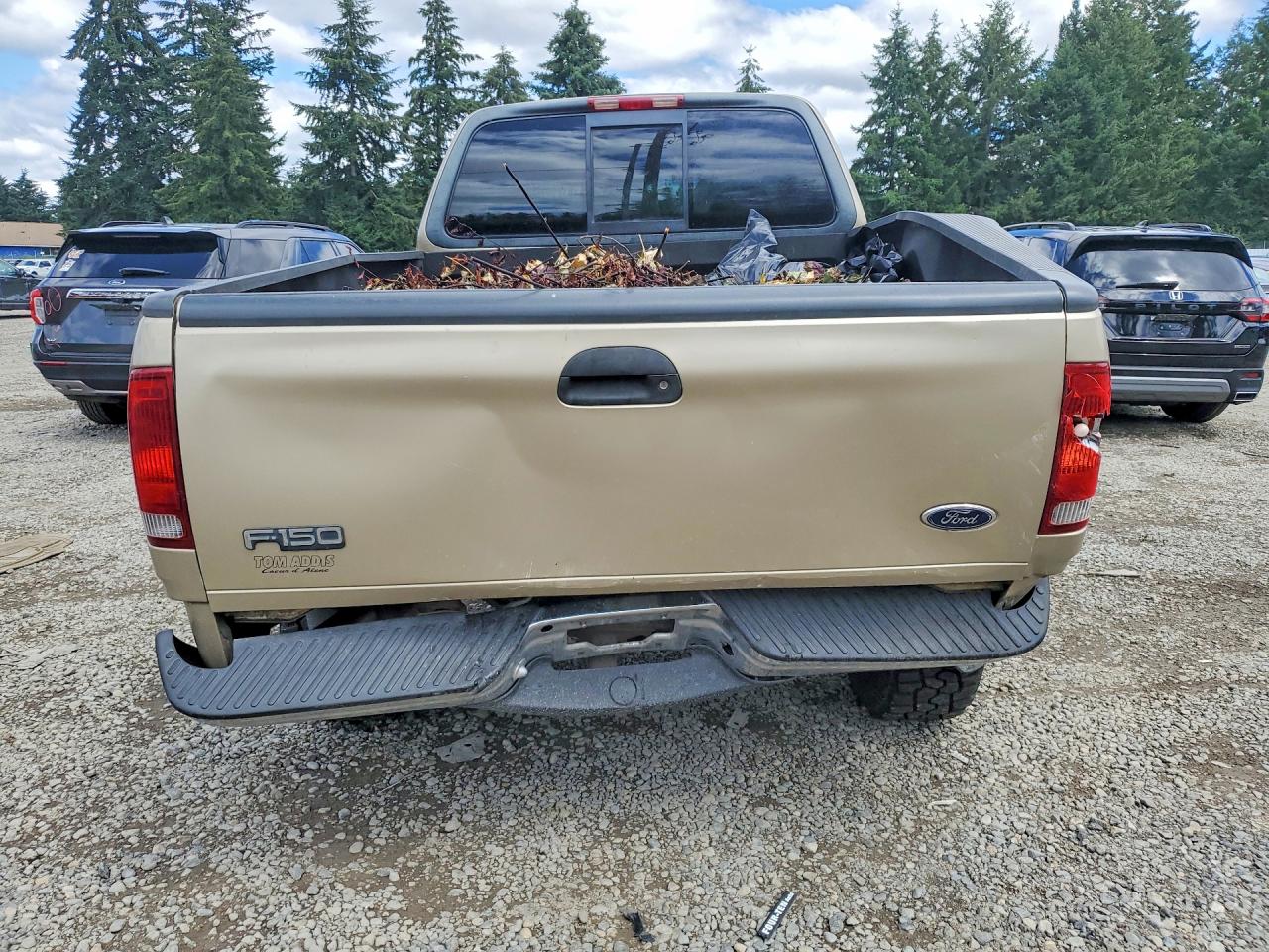 1999 Ford F150 Tan vin: 1FTRX18L8XNA84220