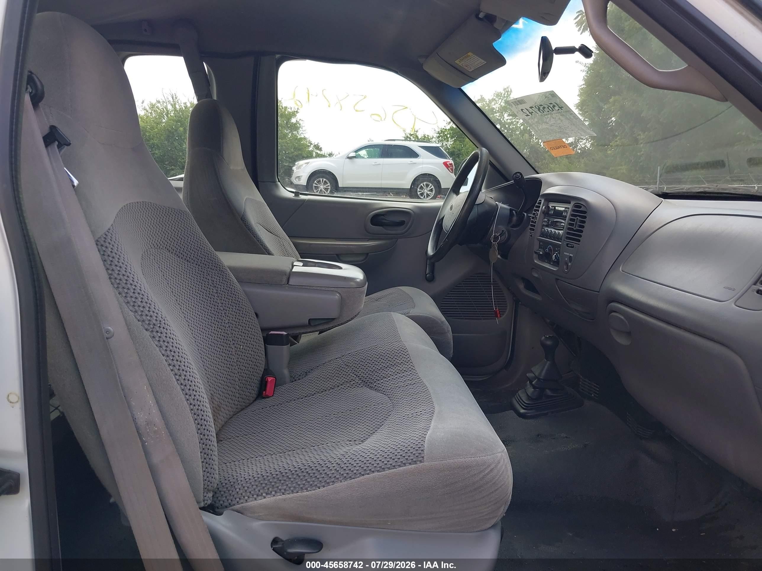 1999 Ford F150   White vin: 1FTRX18W3XNB07252
