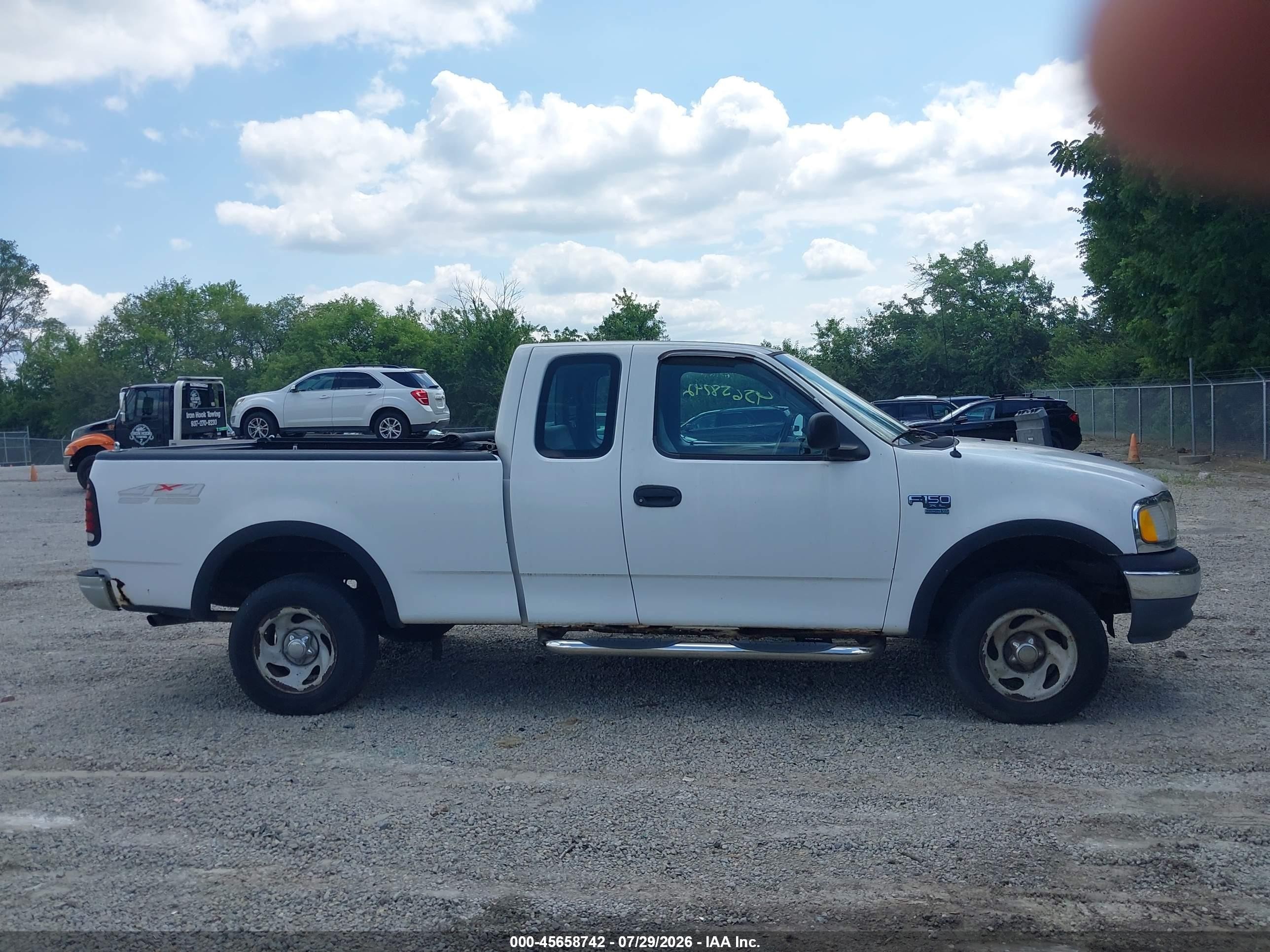 1999 Ford F150   White vin: 1FTRX18W3XNB07252