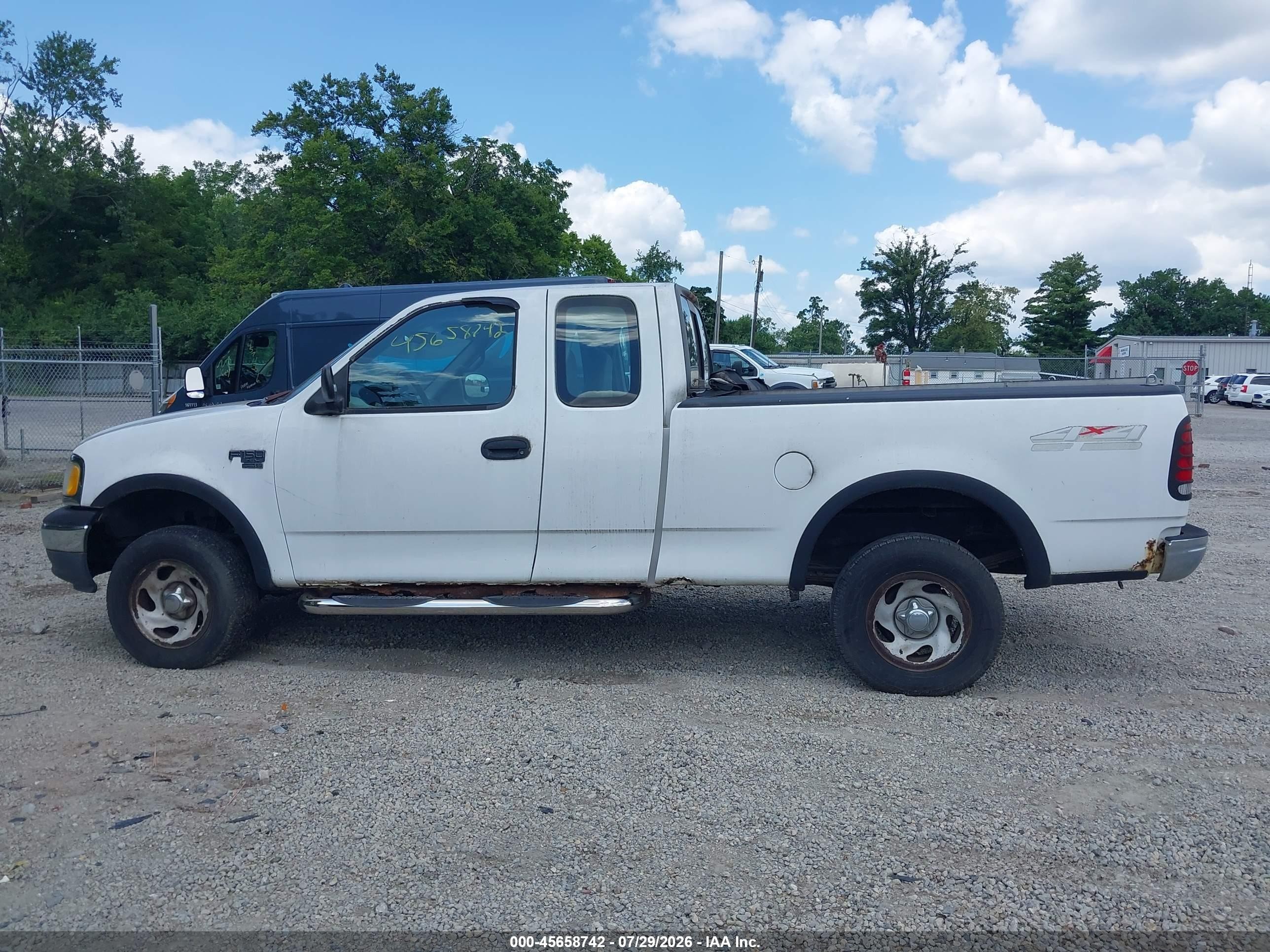1999 Ford F150   White vin: 1FTRX18W3XNB07252