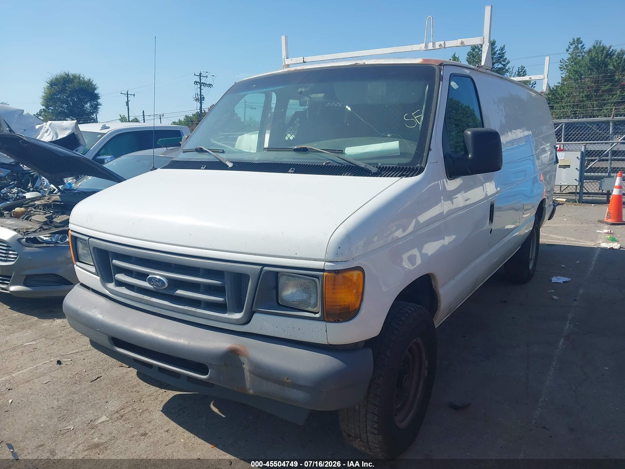 2006 Ford E-350 Super Duty   White vin: 1FTSS34LX6HB34372