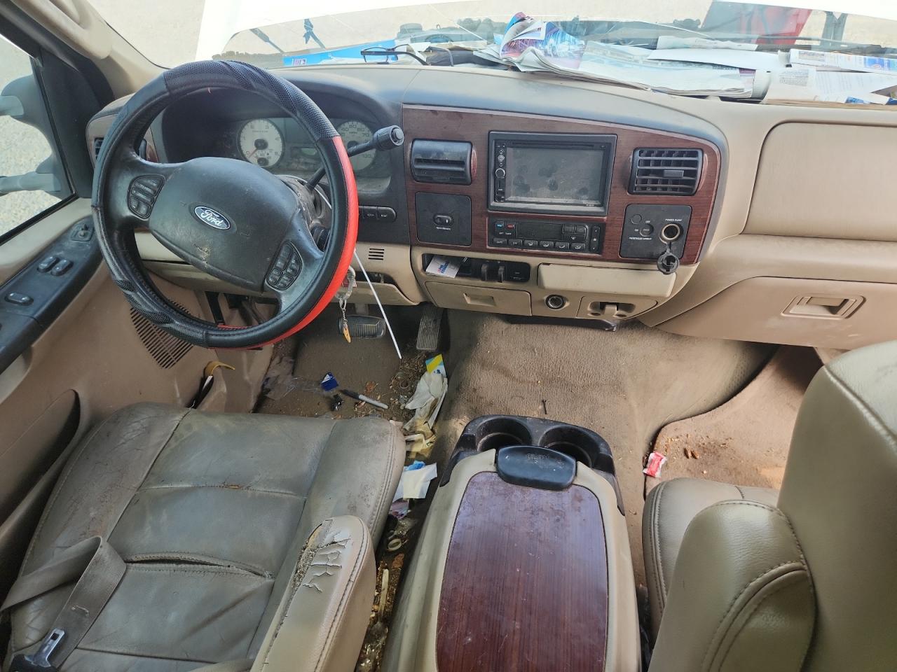 2005 Ford F250 Super Duty White vin: 1FTSX20P45EC28218 Damage: Left Front Seat, Torn, > 12 Inches