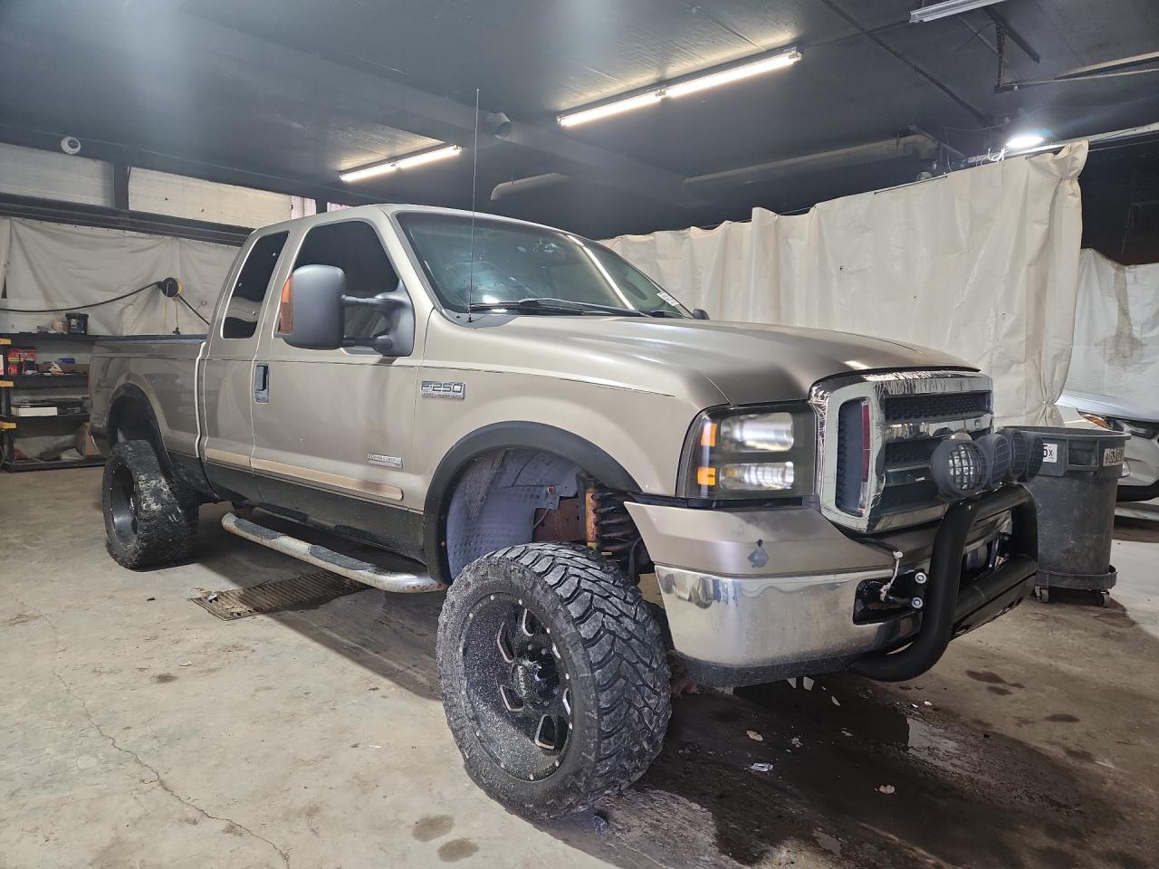 2006 Ford F250 Super Duty Tan vin: 1FTSX21P06EC18902 Damage: Right Front Door, Dent(S) W/ Paint Dmg, 1 To 2 Inches