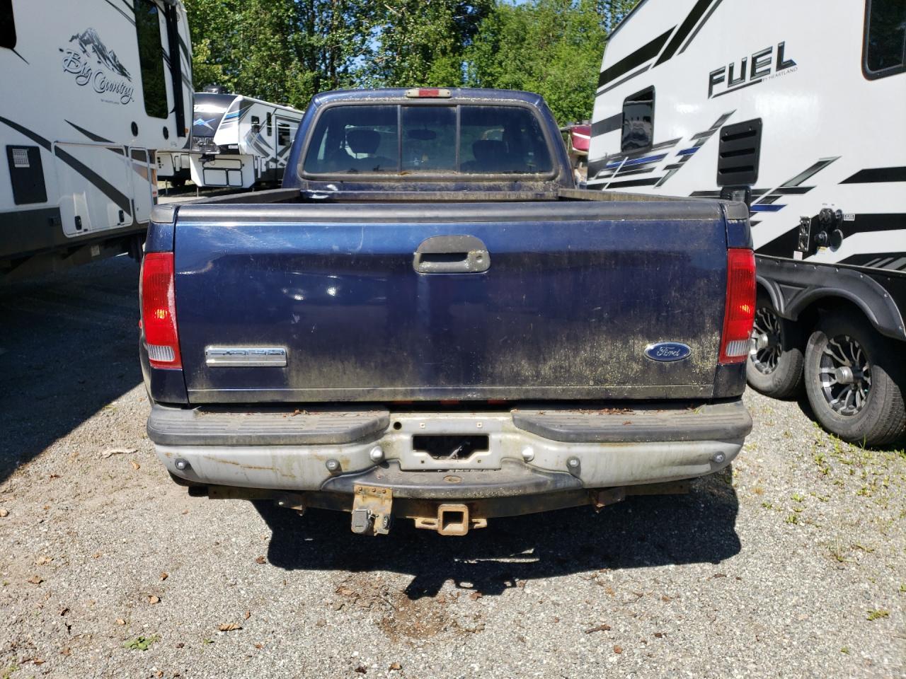 2005 Ford F350 Super Duty Blue vin: 1FTWX33P35EC32831 Damage: Tailgate, Heavy Scratch, 4 To 5 Inches