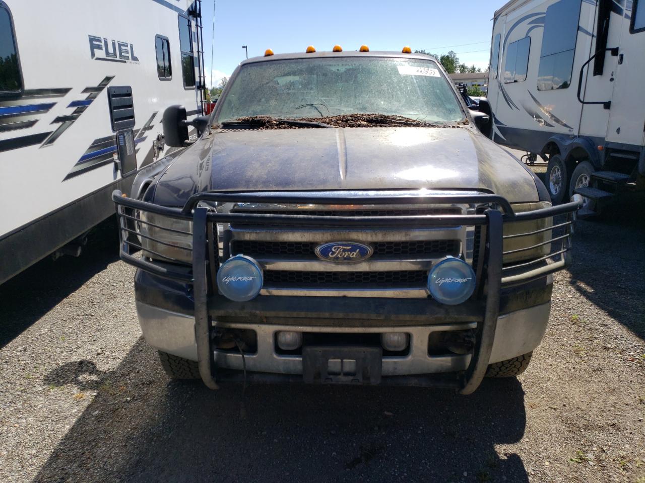2005 Ford F350 Super Duty Blue vin: 1FTWX33P35EC32831 Damage: Front Bumper/Guard, Aftermarket, Acceptable
