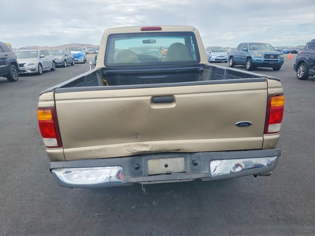 1999 Ford Ranger Желто-коричневый vin: 1FTYR10C2XPB64103
