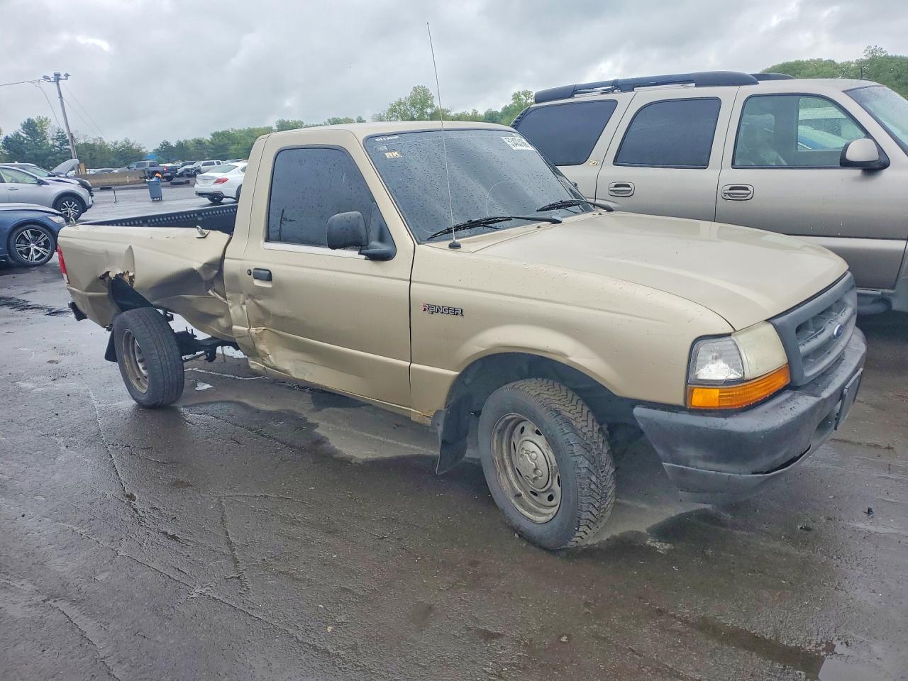 2000 Ford Ranger Gold vin: 1FTYR10C5YTA99577