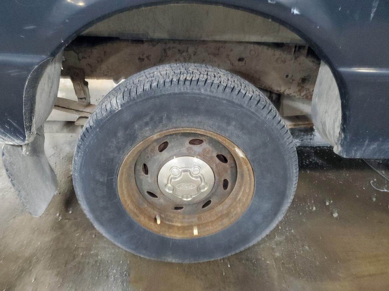 2000 Ford Ranger White vin: 1FTYR10C6YTA35466 Damage: Right Rear Wheel, Rust, Repair Required