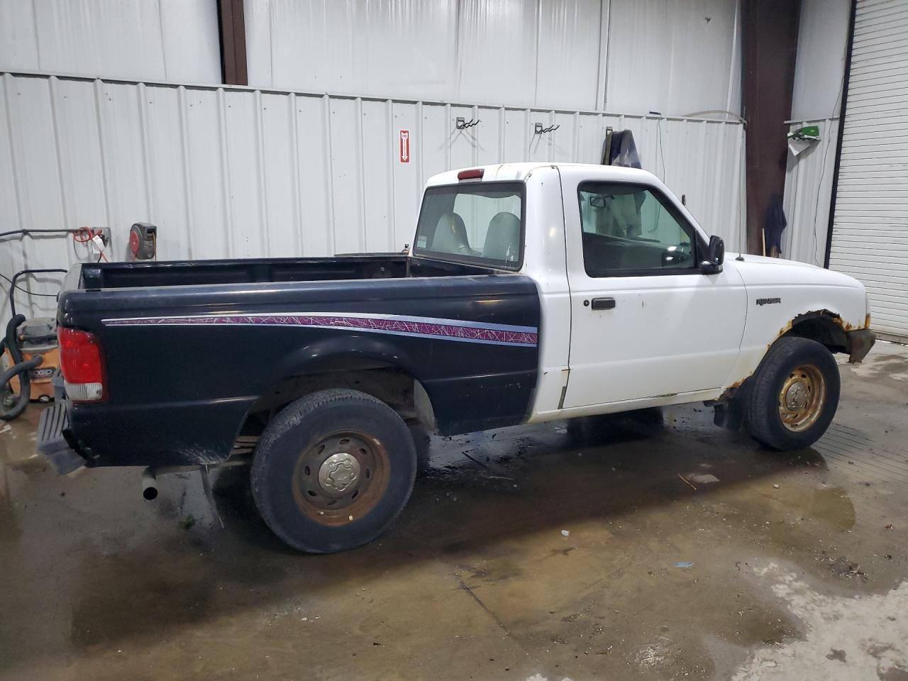 2000 Ford Ranger White vin: 1FTYR10C6YTA35466 Damage: Right Rocker Panel, Rust, 5 To 6 Inches