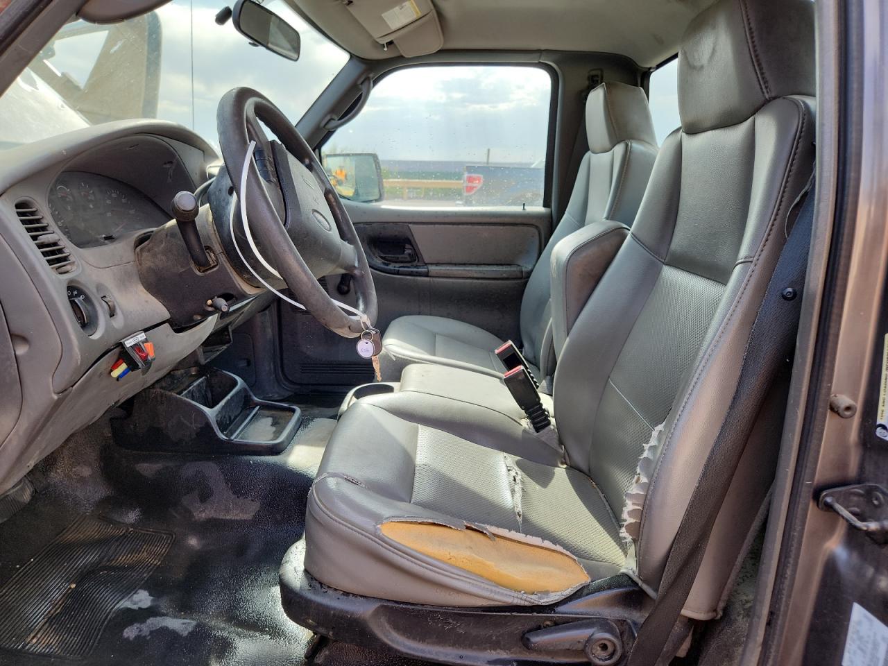 2009 Ford Ranger Gray vin: 1FTYR10D19PA05469 Damage: Left Front Seat, Torn, > 12 Inches