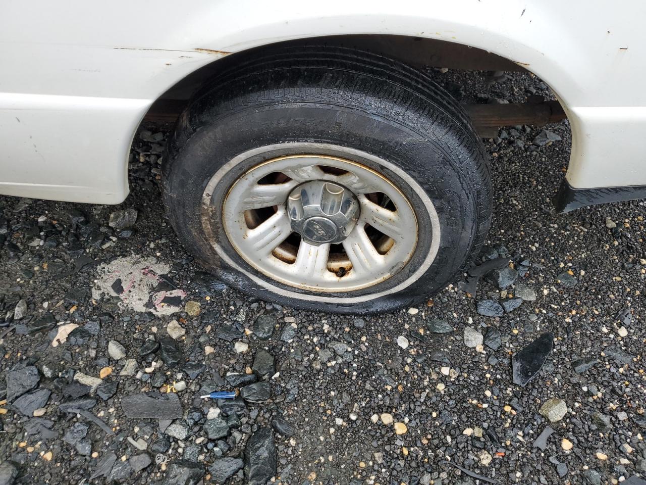 2008 Ford Ranger White vin: 1FTYR10D28PA97321 Damage: Left Rear Wheel, Corrosion, > 12 Inches